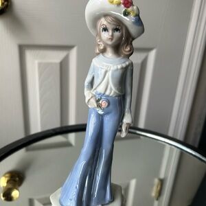 Elegant Porcelain Figurine with Blue Outfit